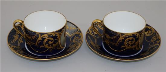 A pair of Sevres style portrait cabinet cups and saucers, by Hutschenreuter, c.1905, saucers 14.5cm